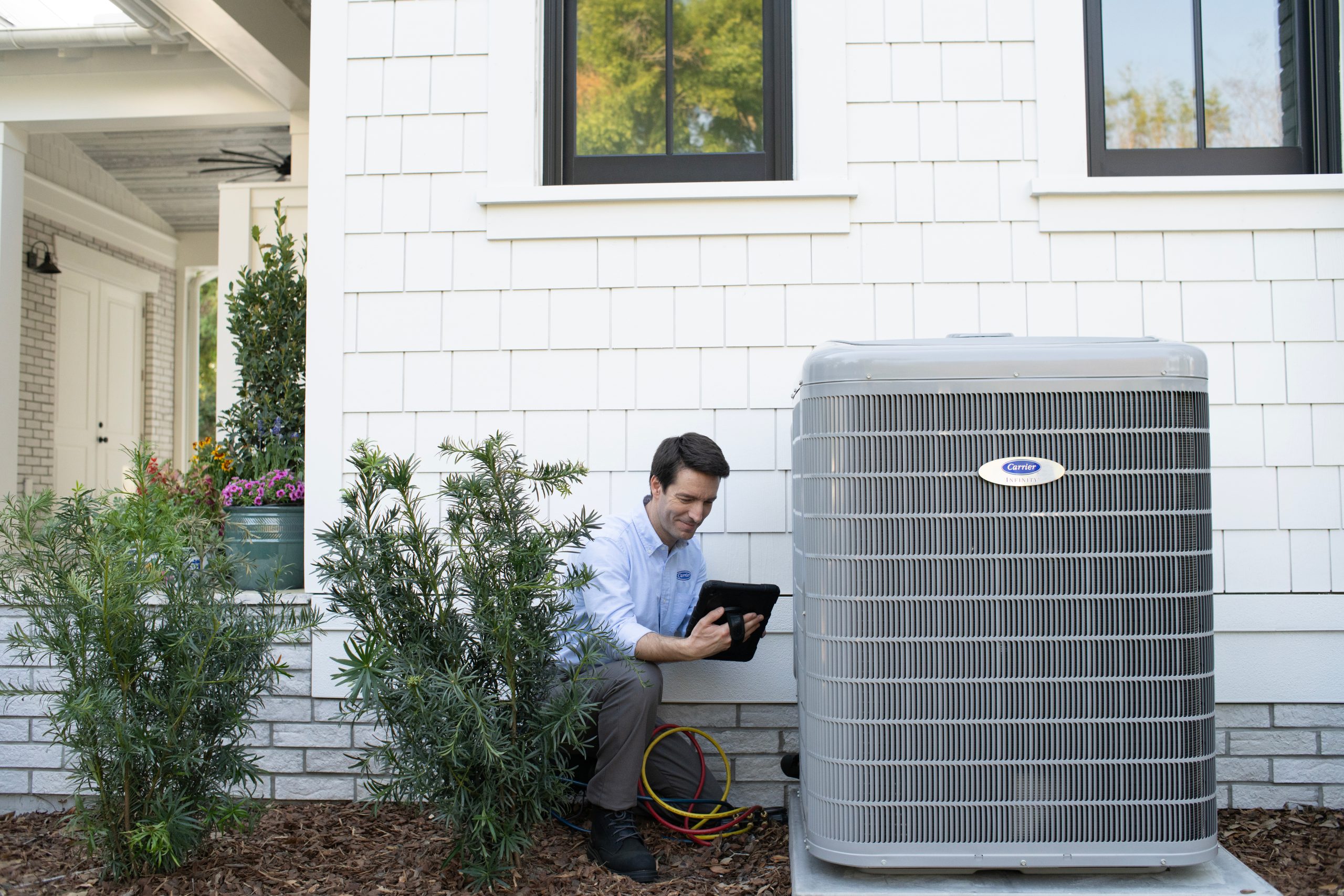 AC_HP_Tech_Carrier_Total_Comfort Anderson Air Corps Legal Action Air Conditioning Inc.|Home