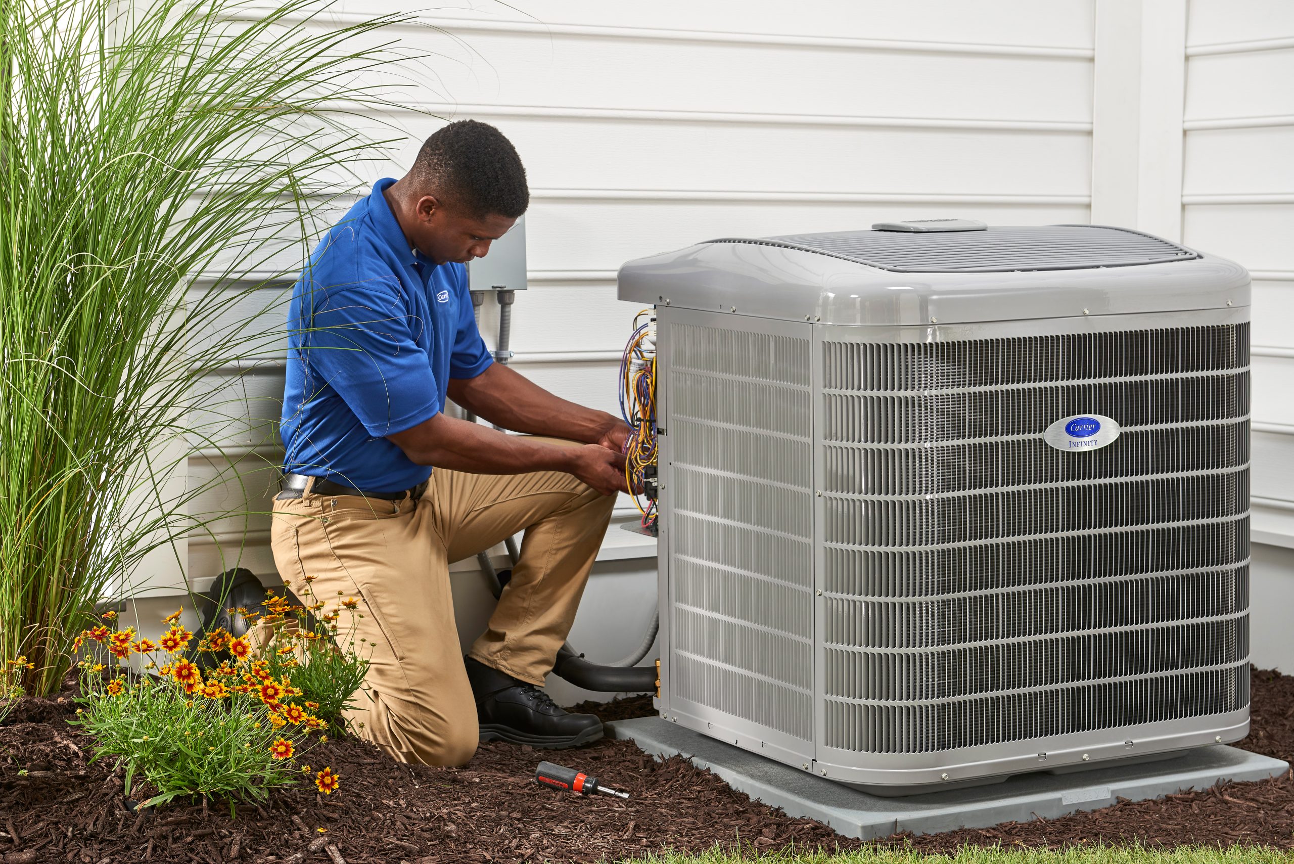 Dealer_Servicing_Outdoor_Unit Anderson Air Corps Legal Action Air Conditioning Inc.|Home